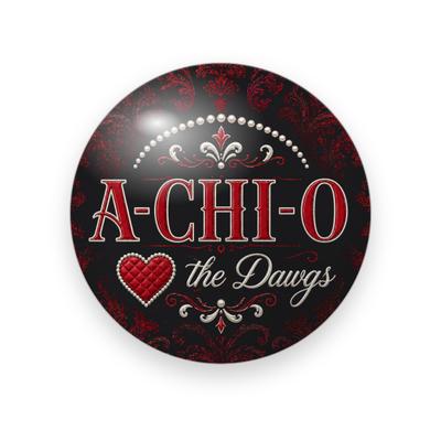 Alpha Chi Omega #058 button. Black damask background with red serif “A-CHI-O” under a pearl arc, a quilted red heart and cream script “the Dawgs.”