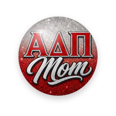Alpha Delta Pi #051 button. Silver-to-red glitter background with red Greek letters and silver glitter script “Mom.”
