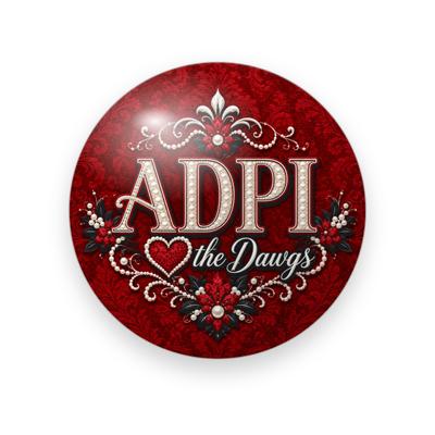 Alpha Delta Pi #077 button. Red damask background with pearl-studded cream serif “ADPI”, a red heart, cream script “the Dawgs”, pearls and red roses.