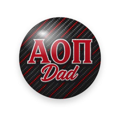 Alpha Omicron Pi #032 button. Black carbon fiber with red diagonal stripes, red varsity Greek letters and red script “Dad.”