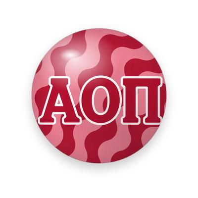 Alpha Omicron Pi #046 button. Red and pink wavy pattern behind red block Greek letters outlined in white.