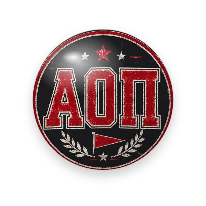 Alpha Omicron Pi #050 button. Distressed black and red varsity patch with red varsity Greek letters, stars, laurels and a pennant.