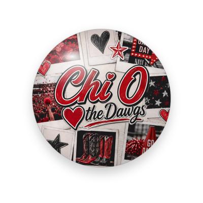 Chi Omega #074 button. Polaroid collage of a red stadium crowd, cowboy boots, pom-poms, and a marquee sign behind red “Chi O” script and “the Dawgs.”