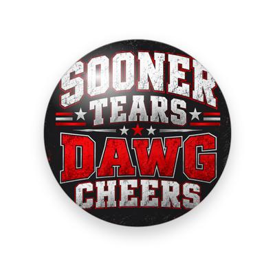 UGA #068 button. Black background with “Sooner Tears” in distressed white block letters above “Dawg Cheers” in red and white, with stars.